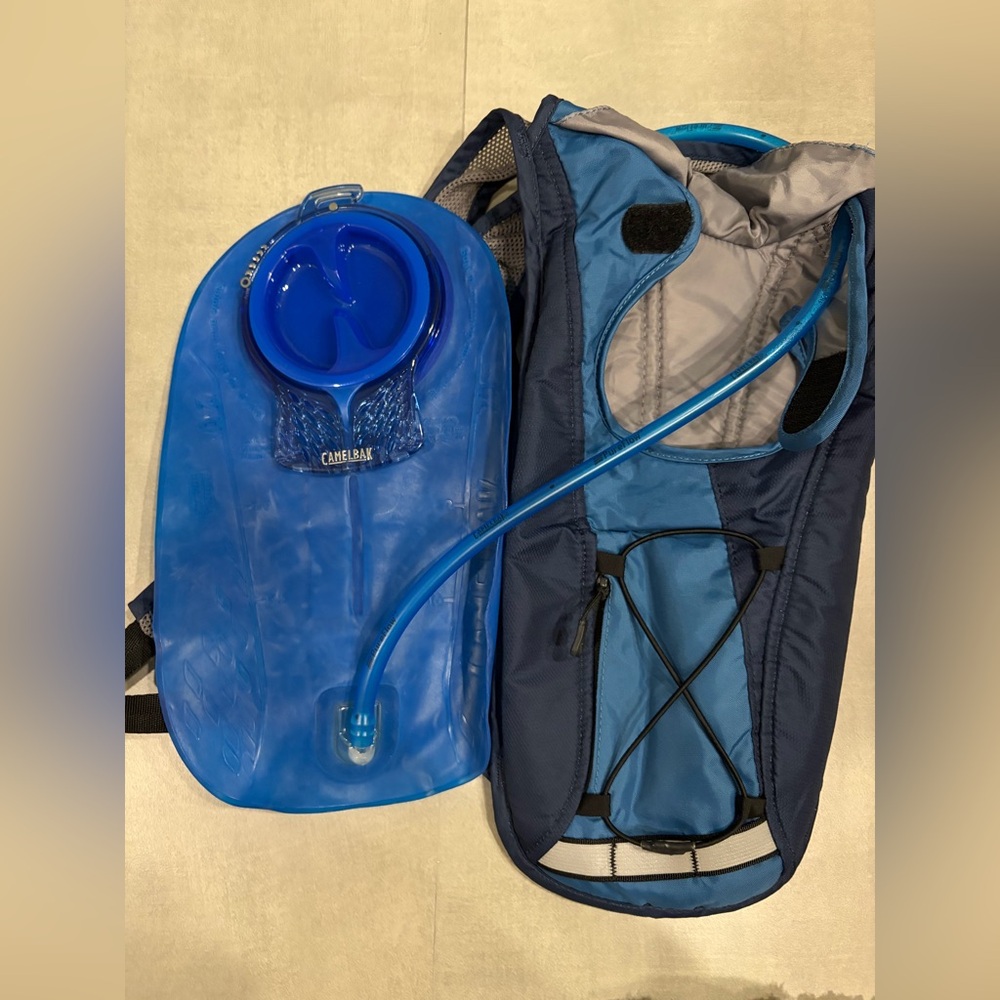Camelbak Blue Hydration Bladder with Matching Blue Pack, gently used.